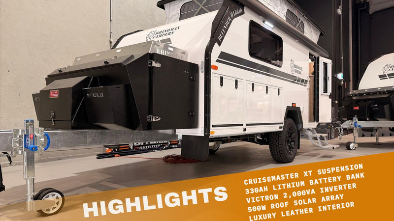 2026 Rhinomax Defender 15 Hybrid highlights: Cruisemaster XT suspension, 330Ah lithium battery bank, Victron 2000VA inverter, 500W roof solar array, luxury leather interior