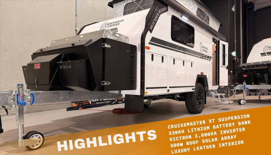 2026 Rhinomax Defender 15 Hybrid highlights: Cruisemaster XT suspension, 330Ah lithium battery bank, Victron 2000VA inverter, 500W roof solar array, luxury leather interior
